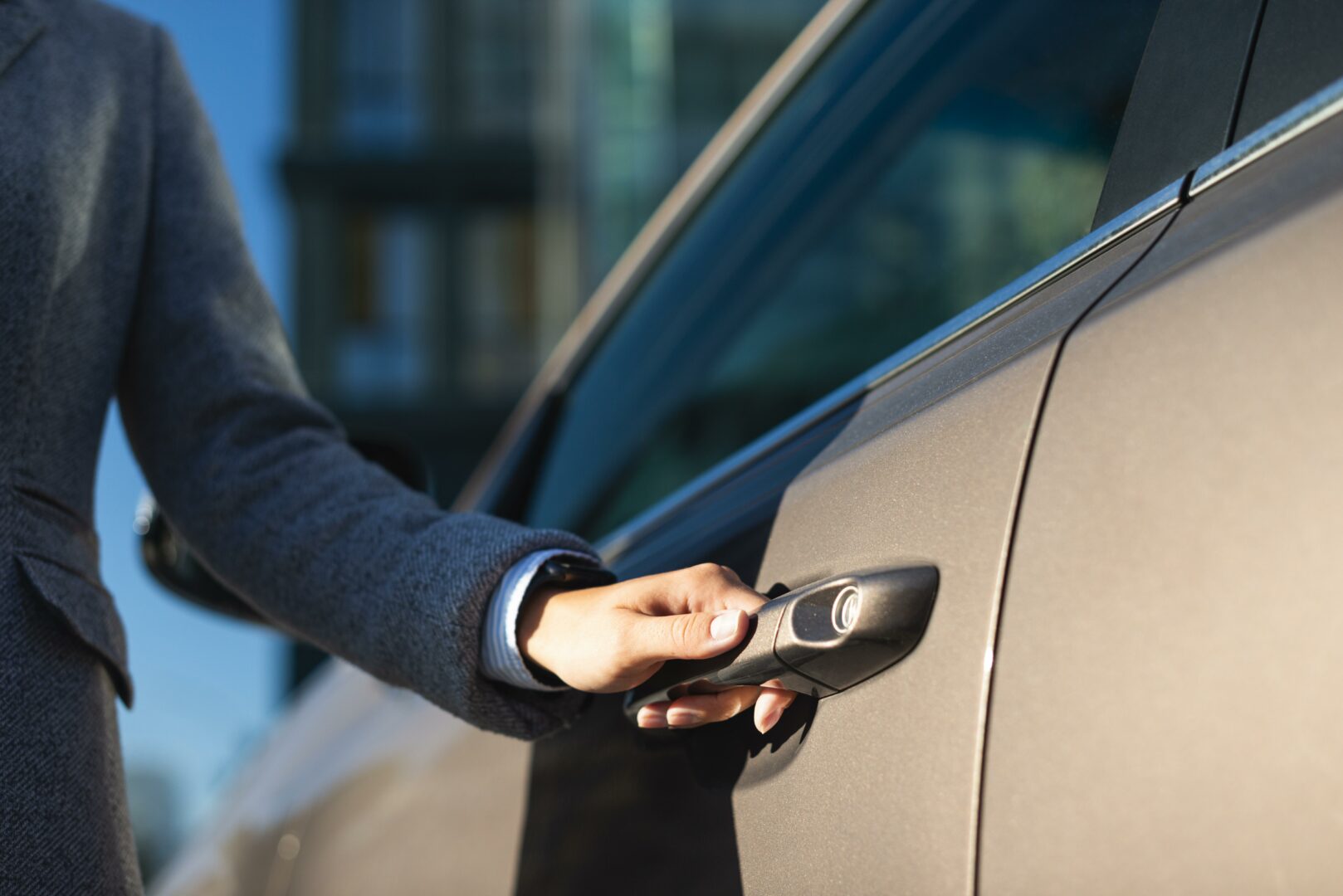 businesswoman-opening-her-car-door