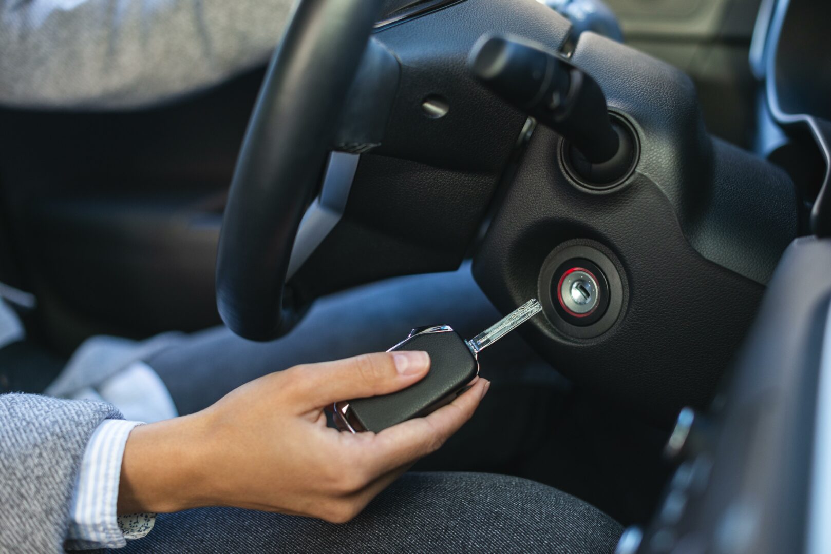 side-view-businesswoman-using-keys-turn-car