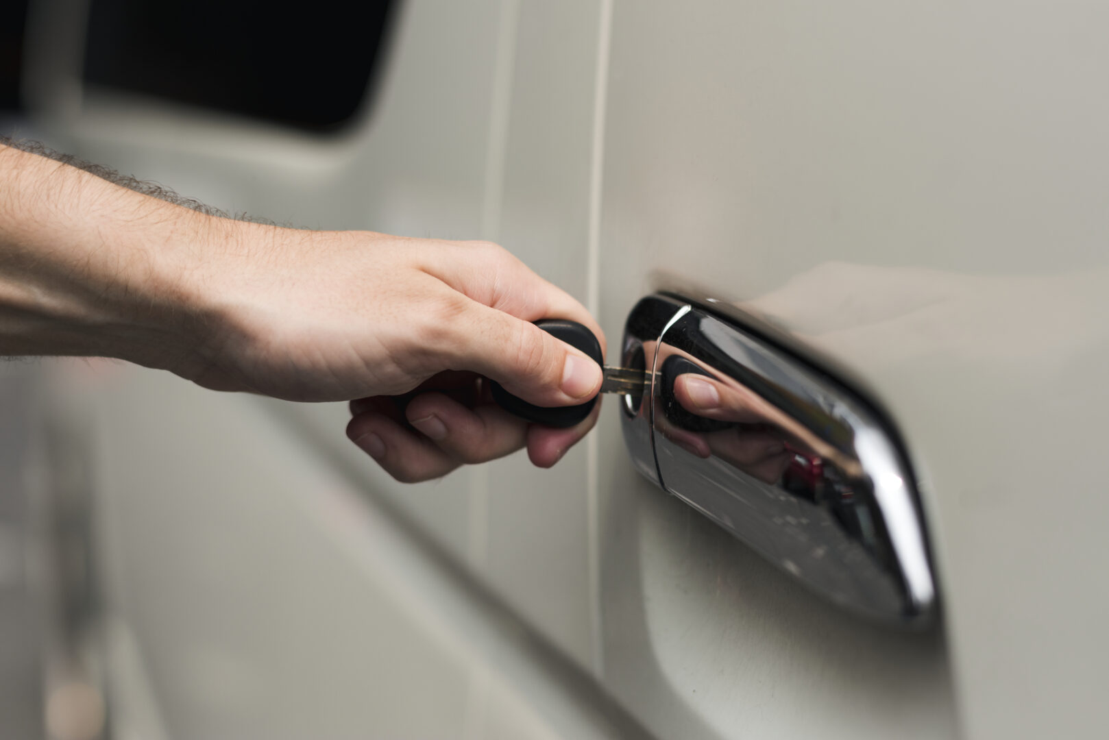 Unlocking a car door with a key